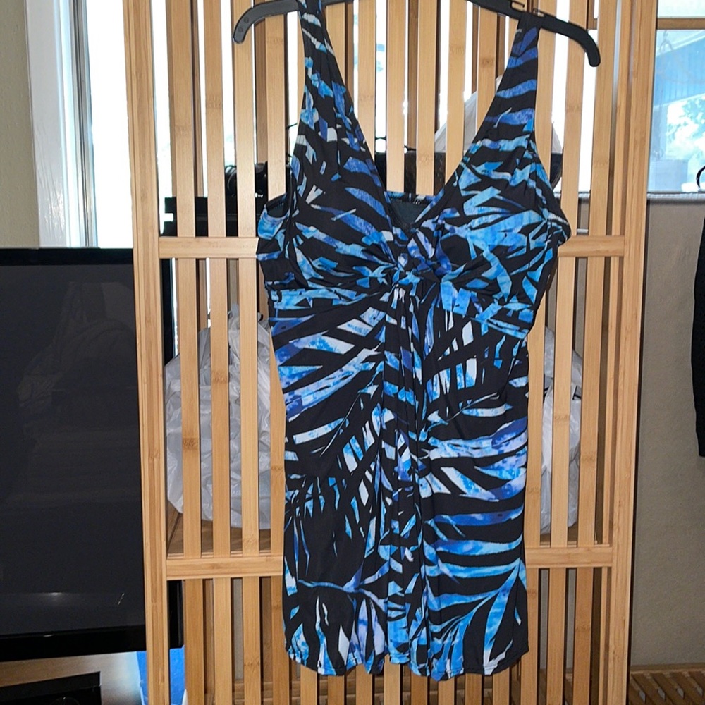 Swimsuit- new, one piece, flattering design, adjustable strap, tummy control